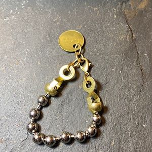 Twisted Silver Bracelet. Coin engraved Twisted